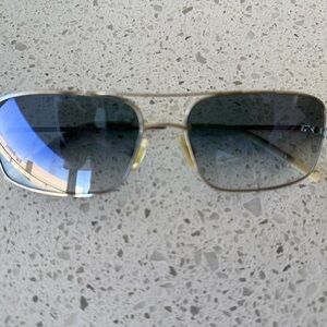 Oliver Peoples Silver metal frames with photo-chromatic lens